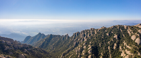 Panoramic aerial drone shot view of Montserrat mountain rage in morning near Barcelona