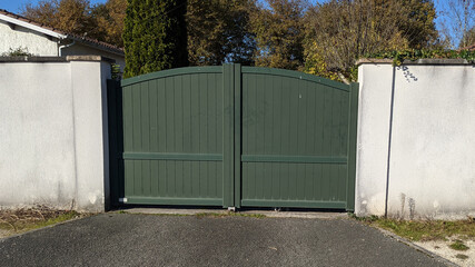 green large modern hight house gate door to access home garden