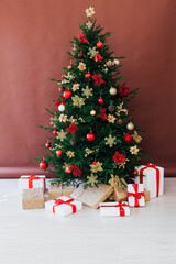 Christmas tree holiday with interior decor gifts for new year background