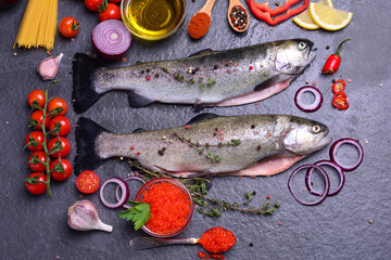 Fish trout with spices and lemon,red caviar
