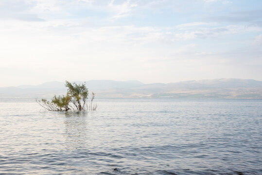 Blue cloudy sky over the Sea of Galilee and Golan Heights over the Sea of Galilee and Golan Heights. High quality photo.