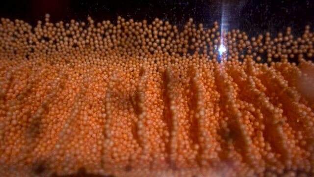 Sound waves using small balls as an example