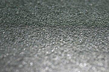 Background picture Black material texture with shining light