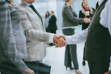 Fototapeta premium close up. successful businessman shaking hands with his business colleague.