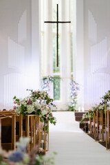 wedding decorations. wedding.wedding wedding ceremony in church.beautiful wedding arch.live flowers.church cross. church for wedding ceremony