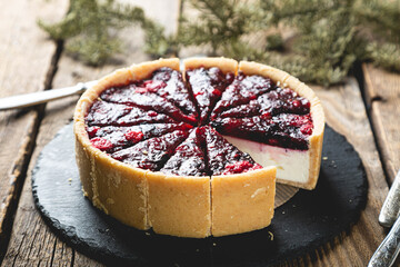 Fresh cheesecake with berry jam