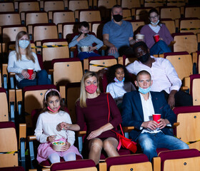 People watching a family movie at the cinema