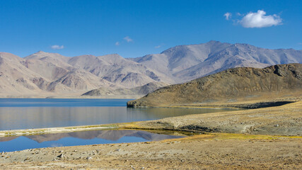 Scenic mountain landscape view of high-altitude Yashilkul lake in the Pamir mountains of Gorno-Badakshan, Tajikistan