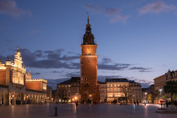 Fototapeta premium Krakow attractions in market square in the evening. Symbol of Krakow, Poland Europe.