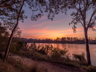 Beautiful Riverside Sunset with Reflections