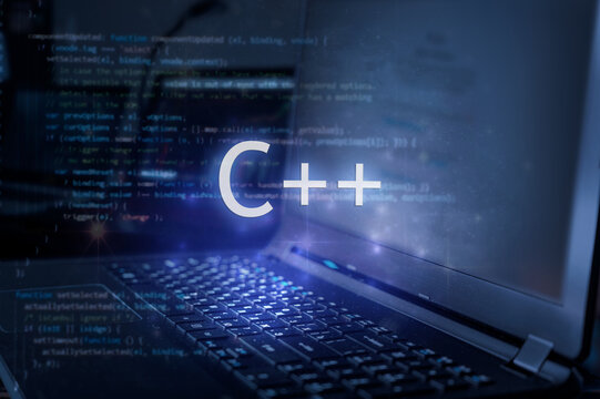 C++ inscription against laptop and code background. Learn C++ programming language, computer courses, training.