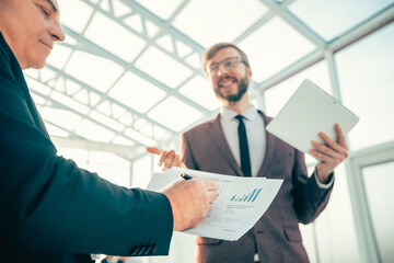 close up. business colleagues discussing the current financial situation.