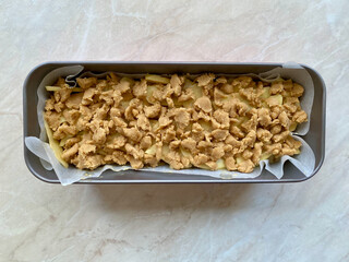 Raw Gateau Invisible Apple Cake in Baking Mold. Ready to Bake.