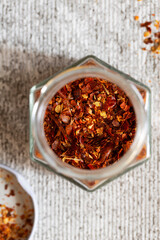 Dried hot chili peppers oriental spices close-up, top view