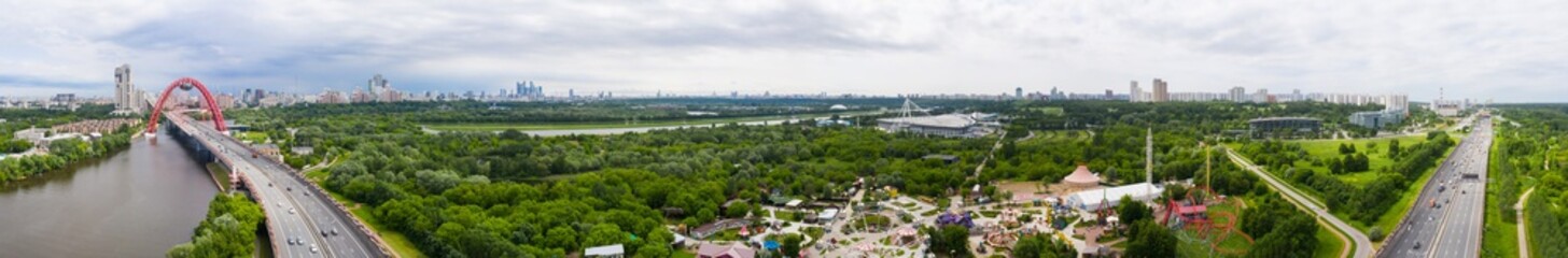 Panoramic view of Moscow on a sunny day, Russia. Picturesque region in the north-west of Moscow city. Zhivopisny bridge across the Moscow river.