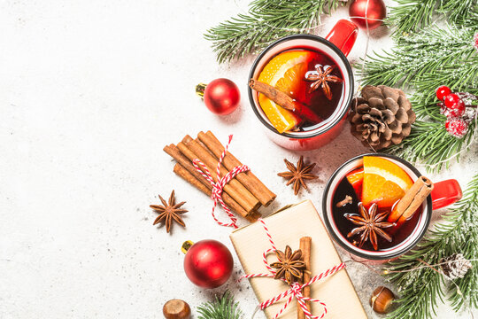 Mulled wine. Traditional christmas and winter drink with red wine, citrus and spices. Top view image.