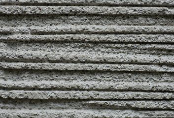 Textures and porosity photos of white concrete surfaces.