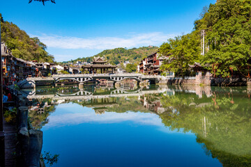 Naklejka premium Scenery of old houses in Fenghuang City, Hunan Province, China. The ancient city of Fenghuang is regarded by UNESCO as a World Heritage Site.