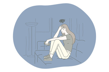 Sadness, mental depression, bad news concept. Young unhappy woman sitting on sofa touching forehead feeling depressed with thoughts after negative events, crying, suffering from loneliness 
