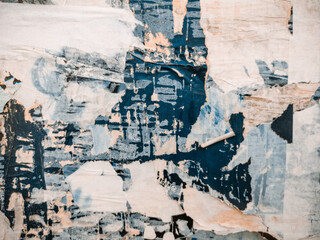 Vintage old posters stuck and torn on the wall in your grunge background