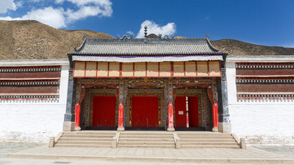 Three red colored doors at Labrang Monastery (Gansu Province / China). Probably a symolism of the...