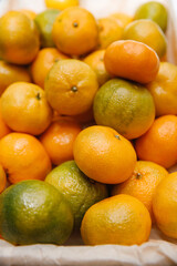 Fresh orange in the basket. Orange is a tropical fruit with sweet and sour taste. Orange is a fruit with high vitamins. Orange is beneficial to the body for health lovers.