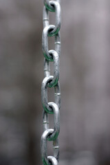 Fototapeta premium several links of a shiny metal chain