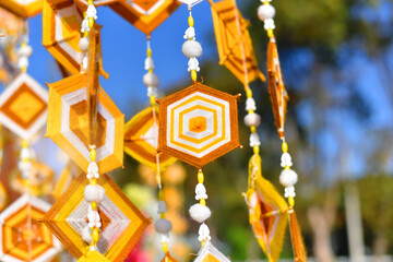 Hanging handmade hexagonal colorful knitting yarn flags. Colorful drape, Blown in the traditional...
