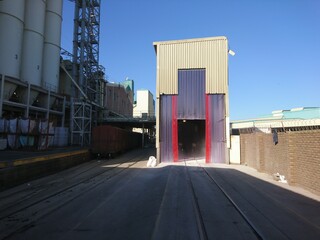 Raw material receiving bay with PVC strip curtains