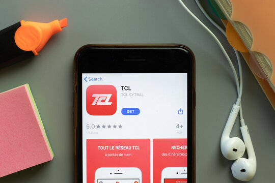 New York, USA - 1 December 2020: TCL mobile app icon on phone screen top view, Illustrative Editorial