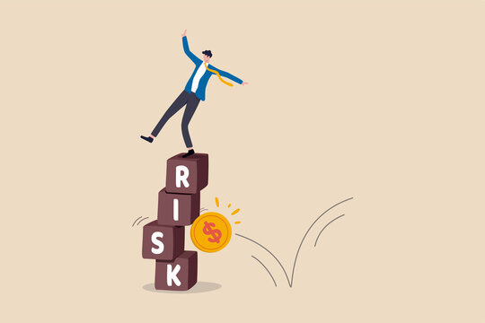 Investment risk, volatility and fluctuation in stock market that price will drop, stability and uncertainty concept, businessman investor falling from stack block with word RISK impact by money coin.