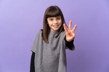 Little girl over isolated background happy and counting three with fingers