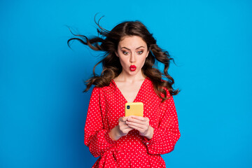 Photo of attractive lady kiss lips look screen wind blow hair vintage clothing isolated on blue...