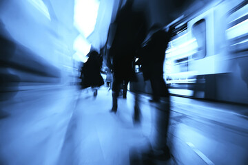 crowd of people metro in motion blurred, abstract background urban traffic people