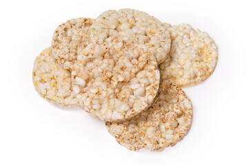 Round puffed multi-grain crispbreads on a white background