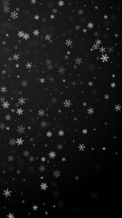 Sparse snowfall Christmas background. Subtle flyin