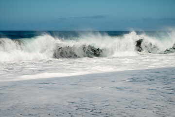 wave breaking on the beach