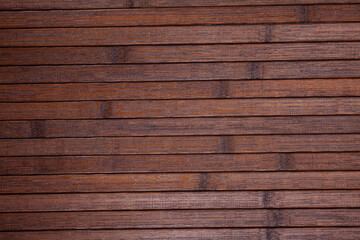 Obraz premium Closeup of natural background with pattern of dark wooden planks