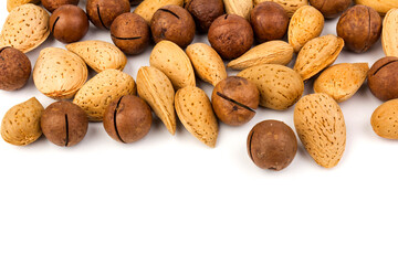 Assorted Nuts. Background of nuts - macadamia, almonds, isolated on white background