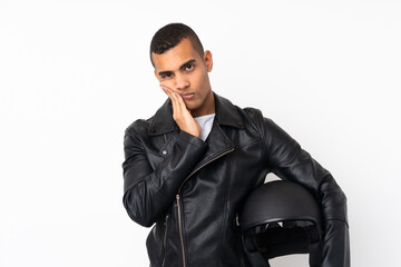 Young handsome man with a motorcycle helmet over isolated white background unhappy and frustrated