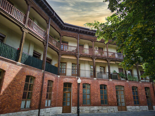 Traditional wooden balconies in the corner square in Valladolid
