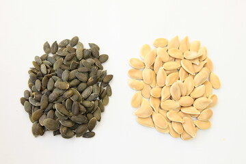 Pumpkin seeds on a white background