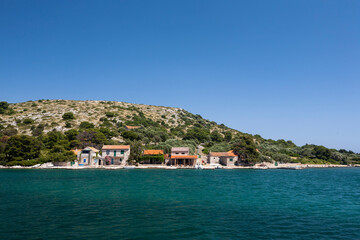 Tiny hamlet inhabited only in Summer on the bay on Otok Lavsa in the Kornati National Park, Croatia