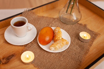 Breakfast in bed, flowers, tea and buns, beautiful food, candles. Dinner in the bedroom. New Year's sides, lights. Christmas breakfast. Pastries