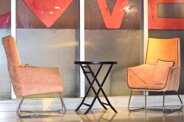 Two chairs and a single table
