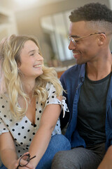 Portrait of cute 30-year old mixed-raced couple