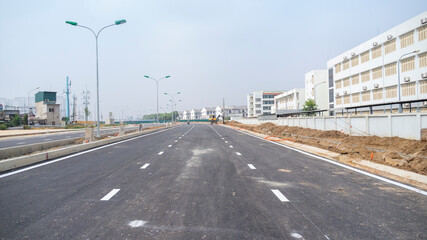 Fototapeta na wymiar Roadway under construction in an outskirt of Hanoi, Vietnam