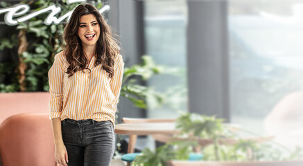 Photo of attractive young brunette woman with beautiful toothy smile