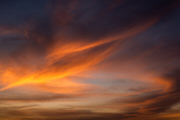 Naklejka na ściany i meble Texture of bright evening sky during sunset