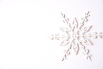 Christmas decor snowflake on white background with copy space